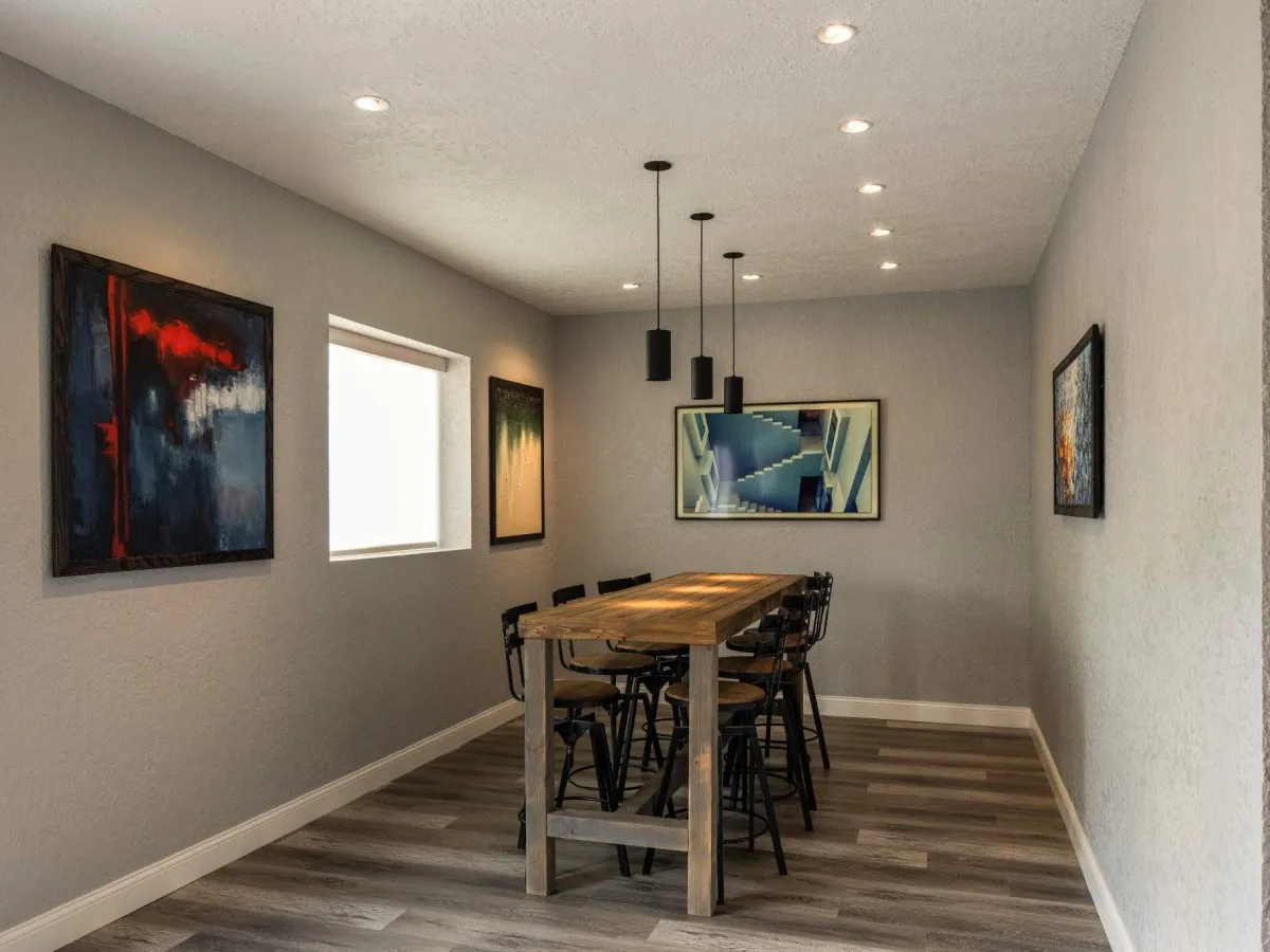 Design consultation room with a high-top table at the AV Connect showroom. Controls walkthrough and support for Bee Cave, TX homes by AV Connect.