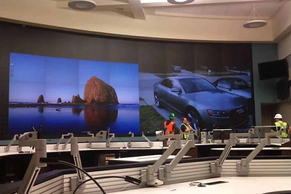 Video wall installed above a row of control-room workstations, an example of the video wall installation AV Connect provides for West Lake Hills, TX businesses.